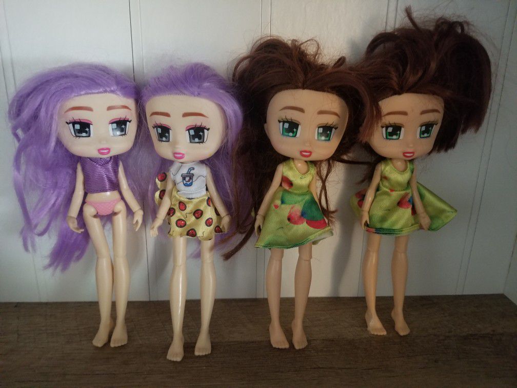 Four Boxy Girl Dolls