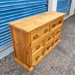 Rustic solid wood dresser. Measures approx: 59" wide x 21" deep x 35.5" tall. Pick up in N Phoenix 