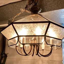 Nice brass and etched glass hanging lamp. Can be swag or ceiling mount