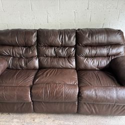 Brown Leather Sofa With Dual Recliners 
