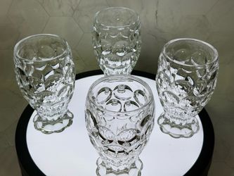 Set of (4) Beautiful vintage Heisey Whirlpool clear crystal iced tea tumblers featuring a distinct optical thumbprint pattern and a fluted, petal-sha