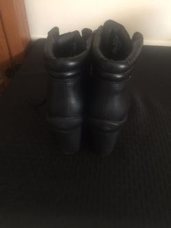 Black work boot with heel