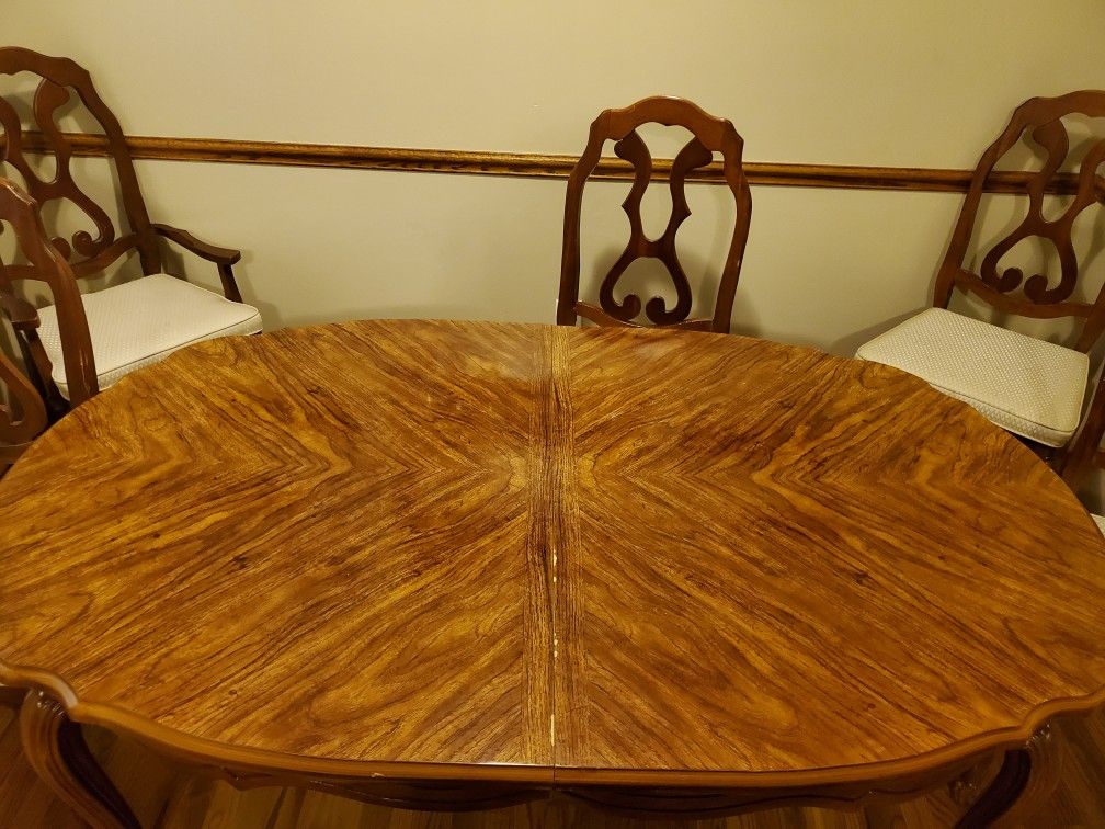 Wood kitchen table and chairs.