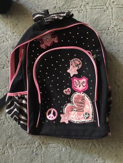 Pink justice backpack