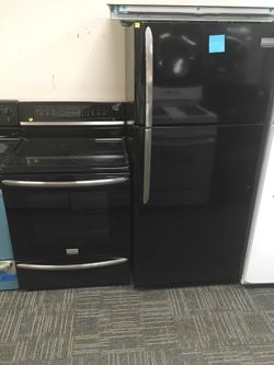 FRIGIDAIRE GALLERY BLACK REFRIGERATOR AND ELECTRIC RANGE