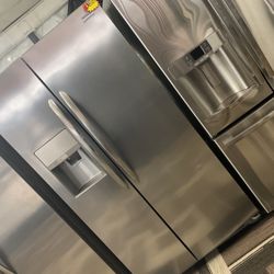 Stainless Steel Side-By-Side Refrigerator Made By Frigidaire From The Gallery Series