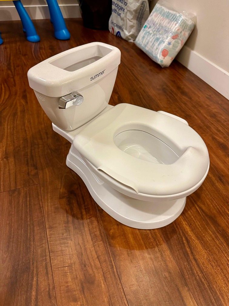 Potty- Unused , Out Of The Box