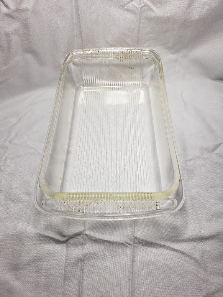 

Miracle Maize Heavy Clear Ribbed Glass Baking Dish 10 " L X 5 1/2" W . Good condition.  Needs some cleaning. Smoke free home. 