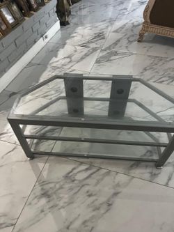 Glass entertainment center table