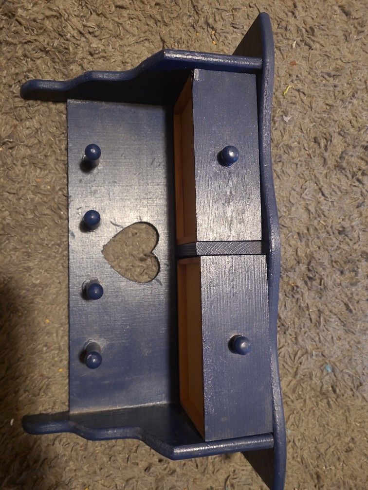 shelf with drawers and heart shaped