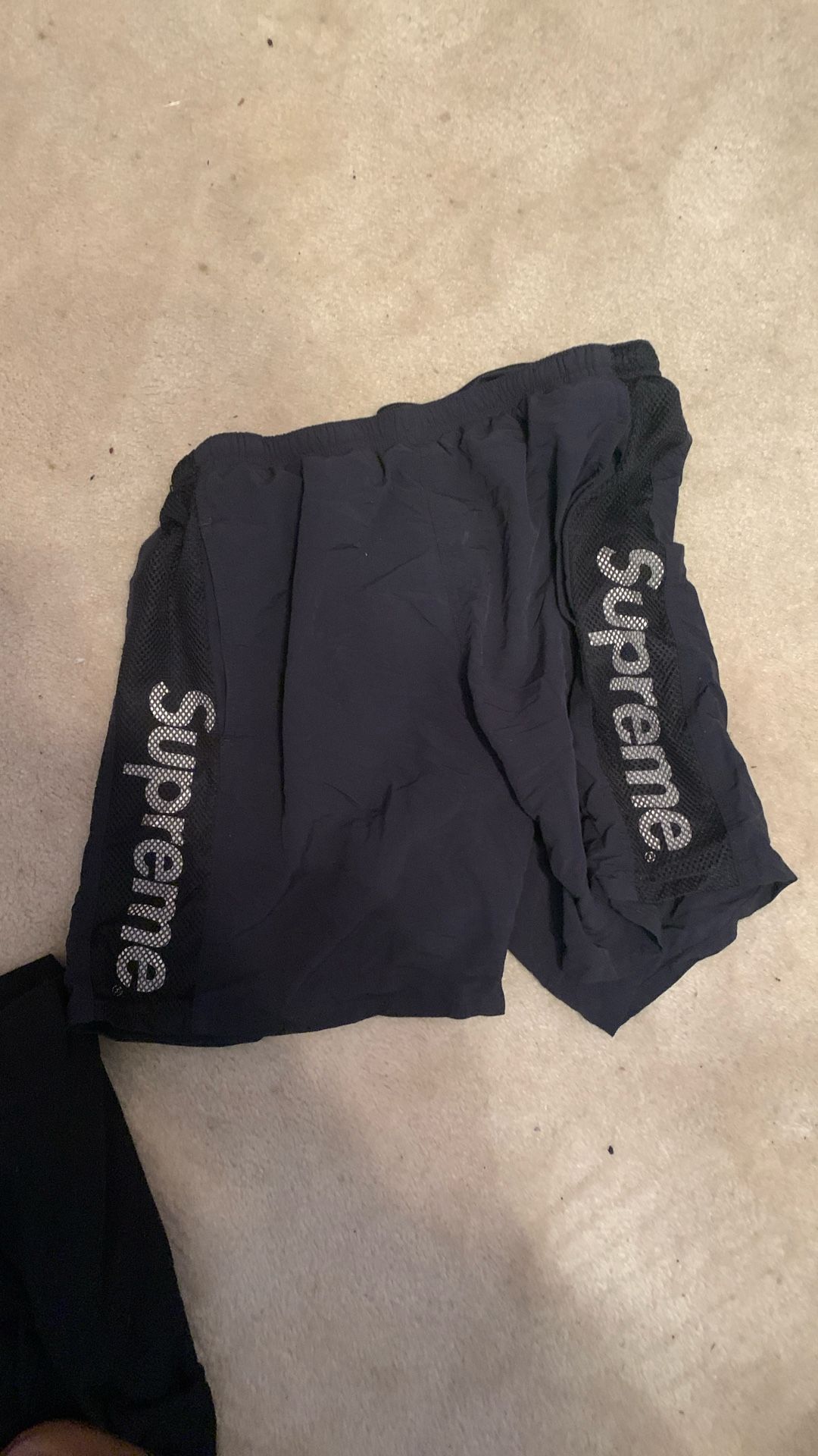 all black and white supreme shorts