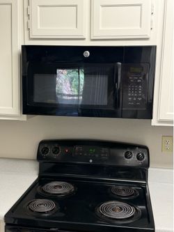Black General Electric microwave