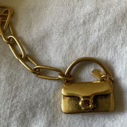 Coach gold tone mini handbag charm bracelet