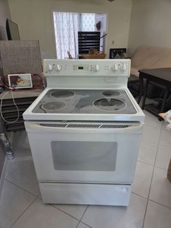 GE White Electric Range with Glass Cooktop