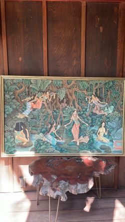 This is a vintage Balinese Ubud folk art painting depicting figures in a jungle setting