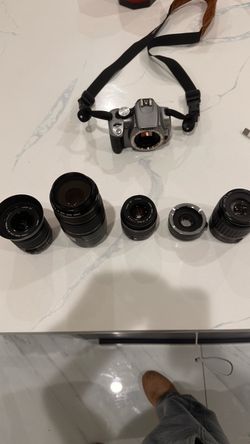 Canon Rebel XT EOS 350D + Many Accessories.  Original battery and 256MB Memory Card included.