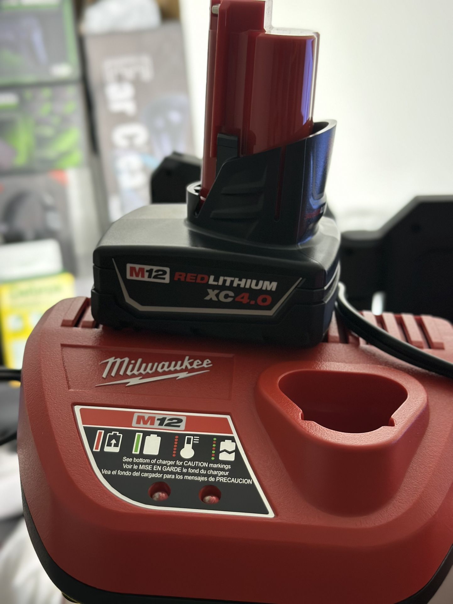 MILWAUKEE M12 BATTERY 4.0 AND CHARGER NEW