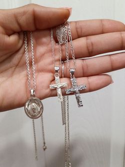 Three Silver chain and Three pendants.