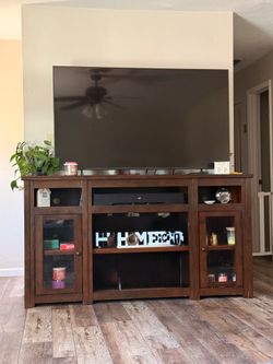 Like New 65” TV and Solid Wood Cherry Entertainment Center