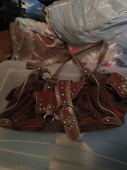 Brown purse Kathy van see land