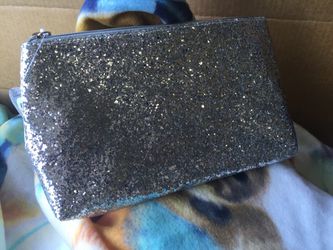 New silver clutch with make-up brush (never used)