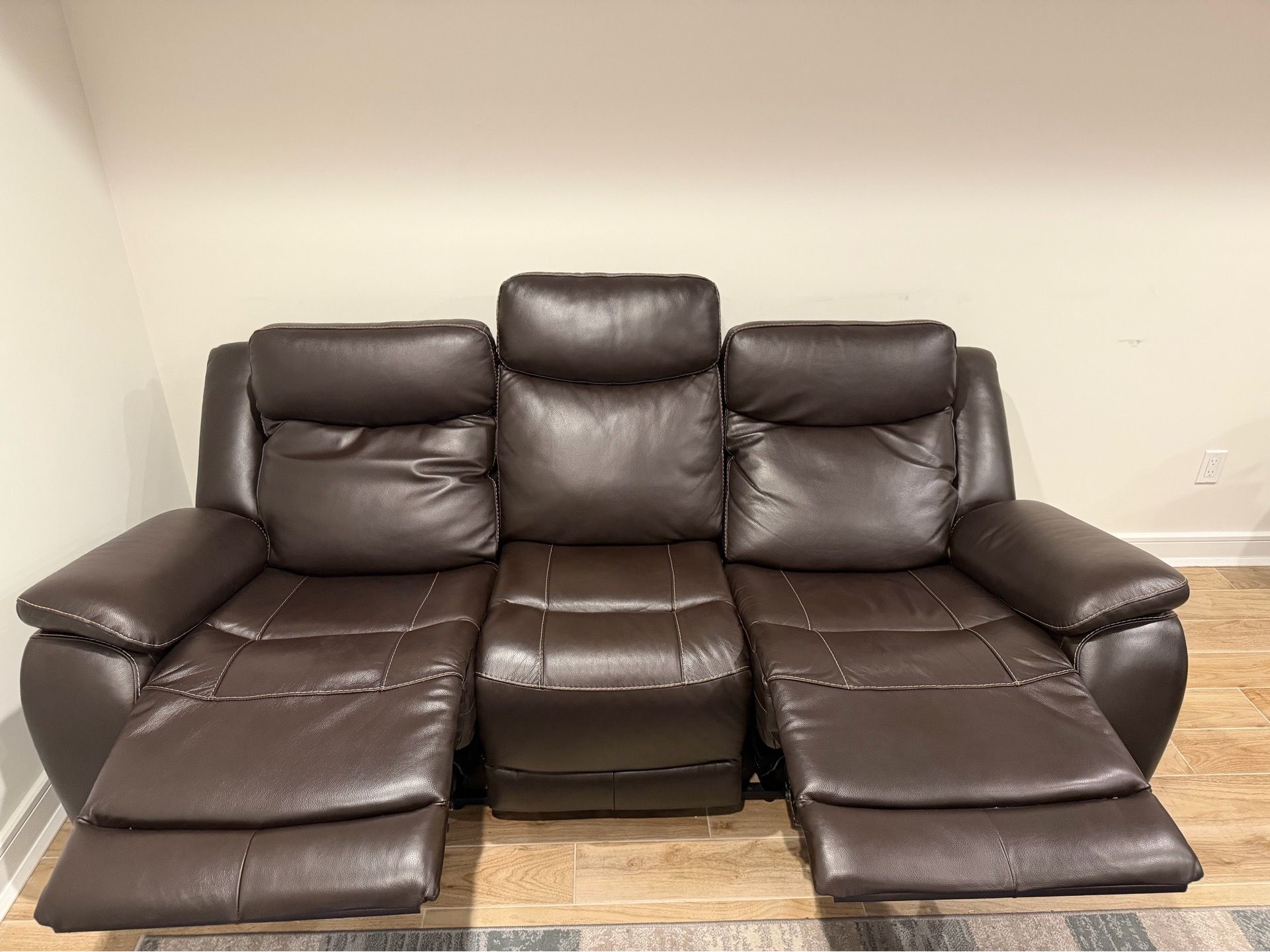Leather power reclining sofa with power headsets