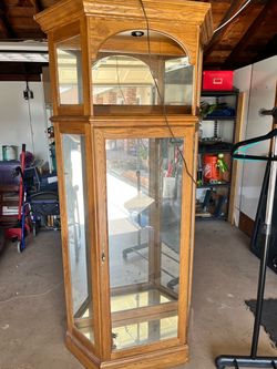 Curio cabinet with glass shelves