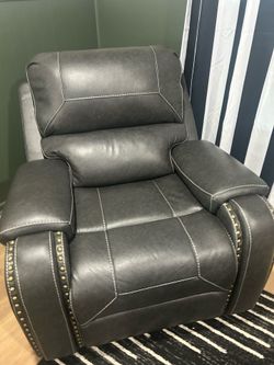 Dark gray rocker recliner