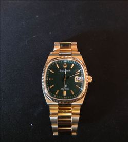 Bulova 262 kHz Gold-Tone Watch Green Dial