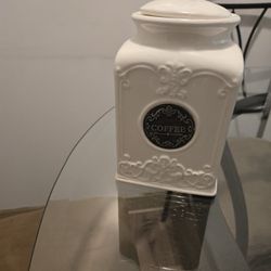 Ceramic coffee jar; NOTE: If it's posted; it's available.  