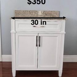 Bathroom Vanity With Sink. New, 30in wide, 34in high and 22in deep. Near Location 1700 N Macdill ave 33607.
