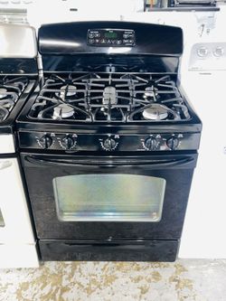 GE black stove, a receipt for a 60-day warranty