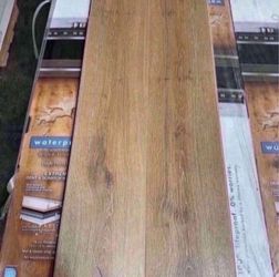 Eagle Plains Oak 14 mm T × 7.6 in. W Waterproof Laminate Wood Flooring