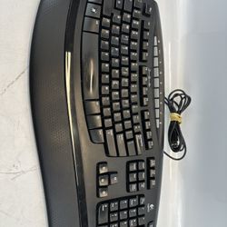 Logitech Wave Keys comfort 450 Ergonomic Keyboard With Cushioned Palm Rest