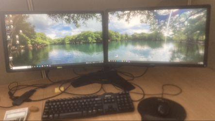 2 Monitors with holding base