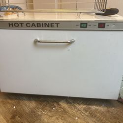 Hot cabinet towel warmer