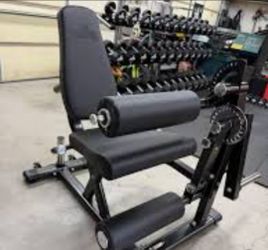 Gronk plate loaded seated leg curl and extension machine for home gyms
