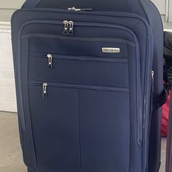 🛄 Samsonite Excellent Quality Soft-side Soltye DLX Spinner Luggage "featuring durable polyester fabric" Exterior Expandable Pockets, and Four Spinner
