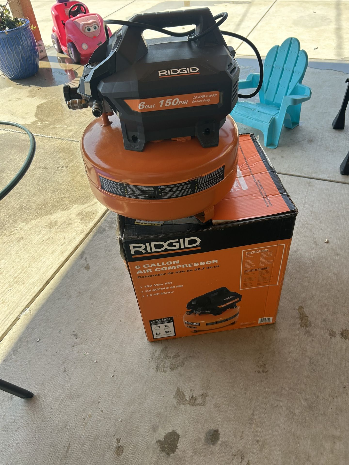 RIDGID 6 Gal. 150 PSI Portable Electric Oil-Free Jobsite Pancake Air Compressor with Dual Pressure Gauges and 2-Quick Couplers