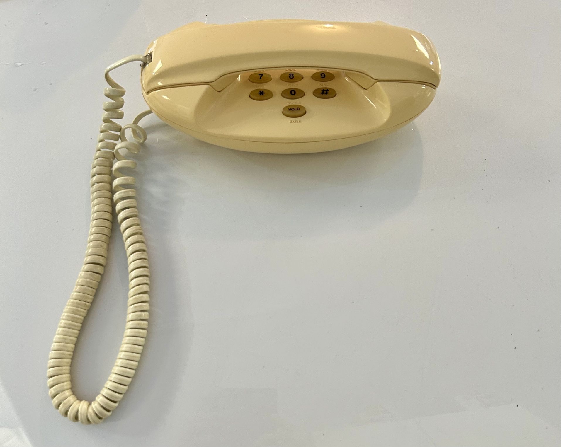 Vintage 1984 TeleQuest Manta Oval Beige Slim Push Button Landline Phone 
