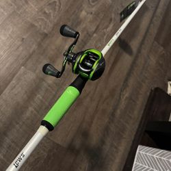 Brand New Lews Left Handed Bait Casting Fishing Combo. 