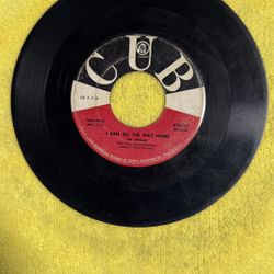 This vintage 45 RPM vinyl record is a collectible single titled "I Ran All the Way Home" by The Impalas, released on Cub Records in 1959. 