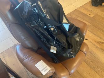 Patagonia large black travel back with wheels. Never used