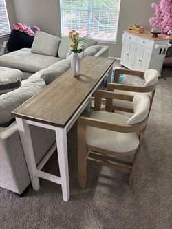 Table with Two Upholstered Chairs
