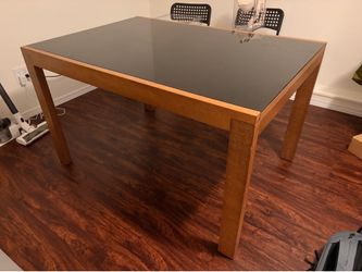 Glass top wooden dining table