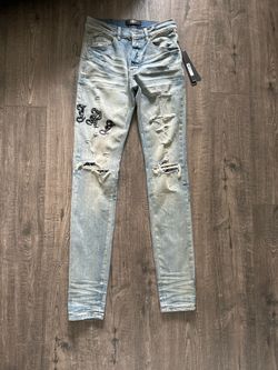 Amiri Old English Clay Indigo Skinny Jeans 