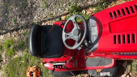 Troy bolt pony riding mower drove until parked a few months ago turns over needs new starter and deck to be level and  blade needs new belt other than