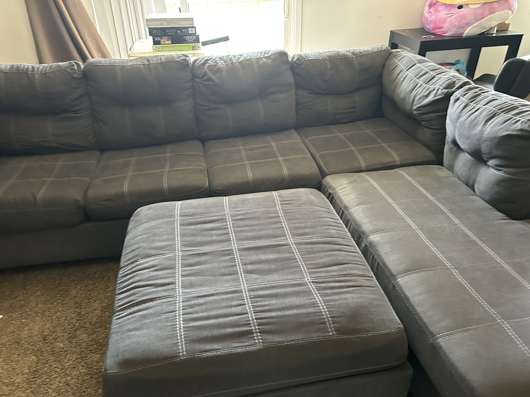2 piece Sectional with Pull Out & Ottoman