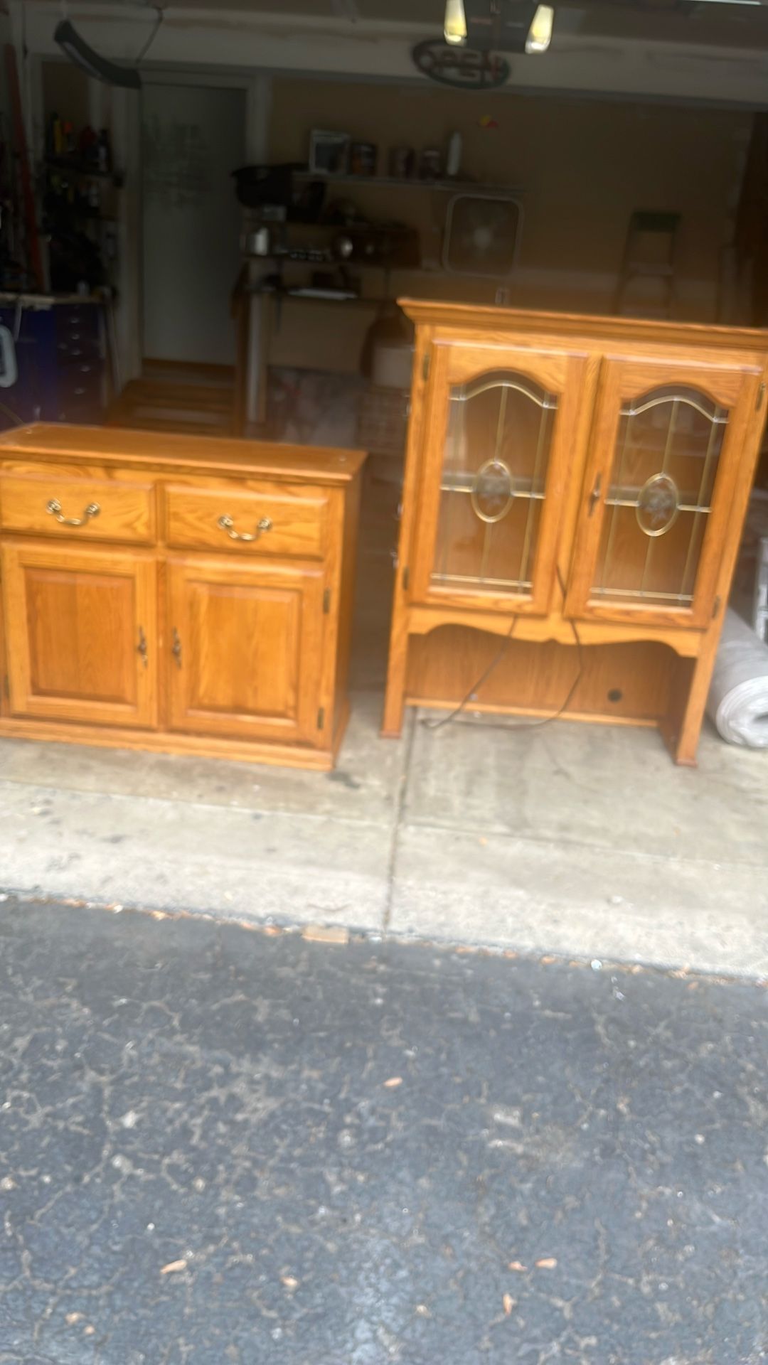 China cabinet with electrical light hooked up top and bottom. Perfect condition with six piece. Matching table, all wood. Great condition. . St strong