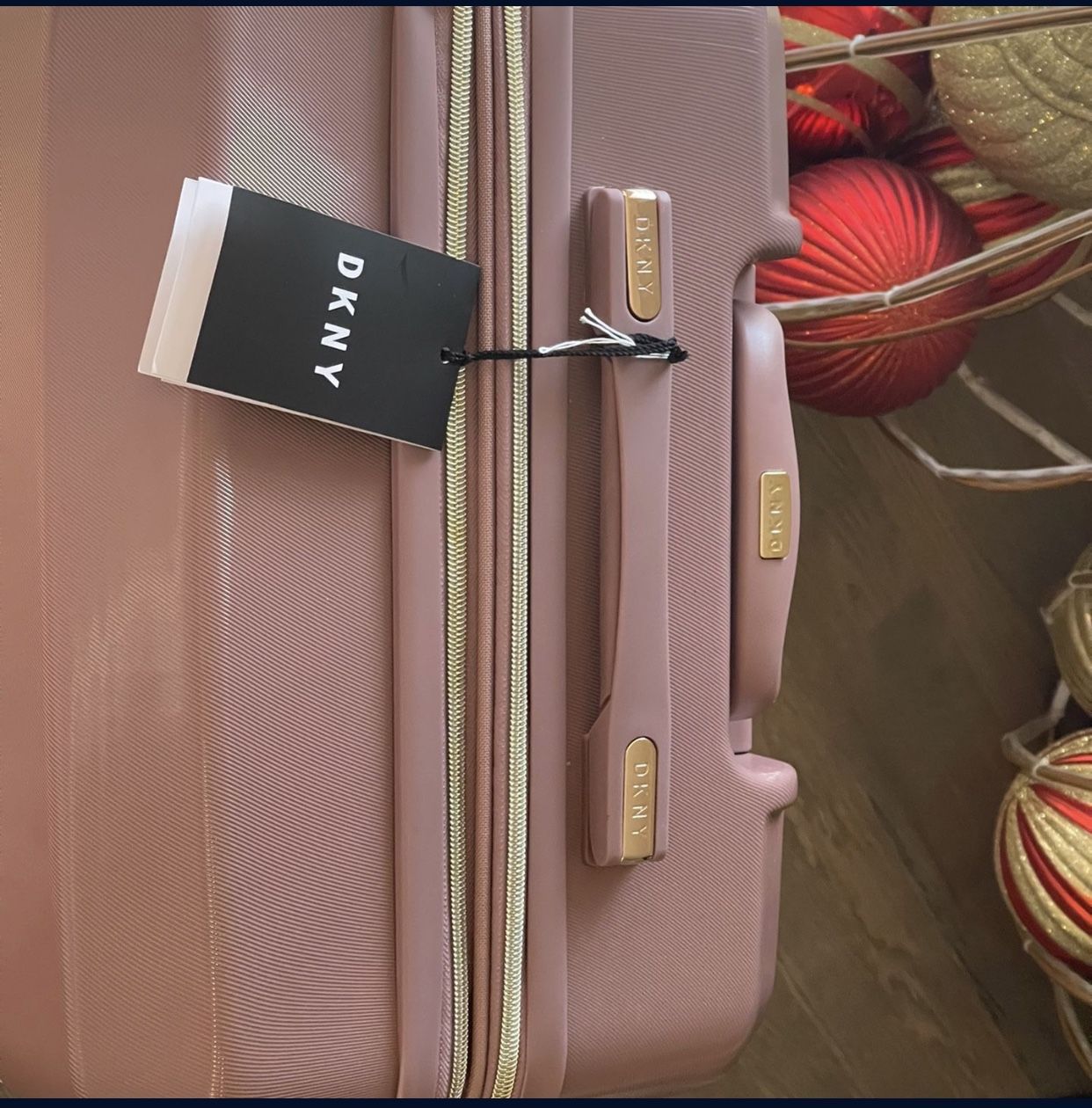 Dkny luggage shop pink
